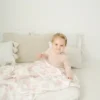 The Gilded Bird – Babyfilt i bambu med vårmönster