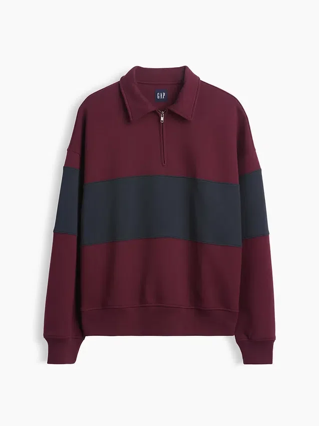 Tjock, oversized tröja med halv dragkedja och ränder
