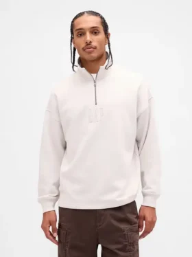 Tjock, oversized tröja med logo och kvartslås