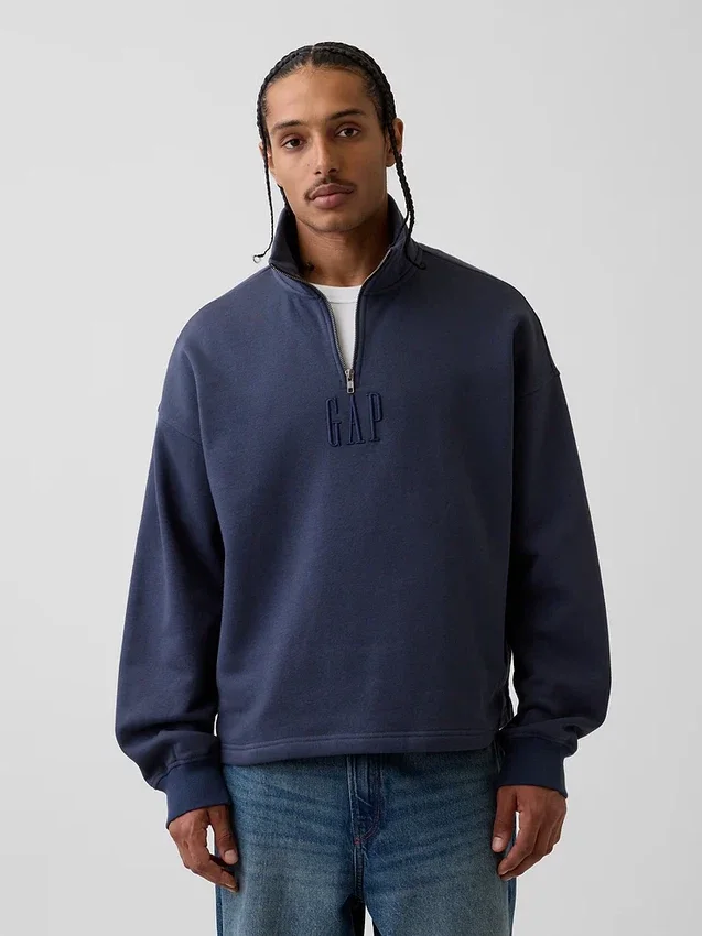 Tjock, oversized tröja med logo och kvartslås