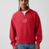 Tjock, oversized tröja med logo och kvartslås