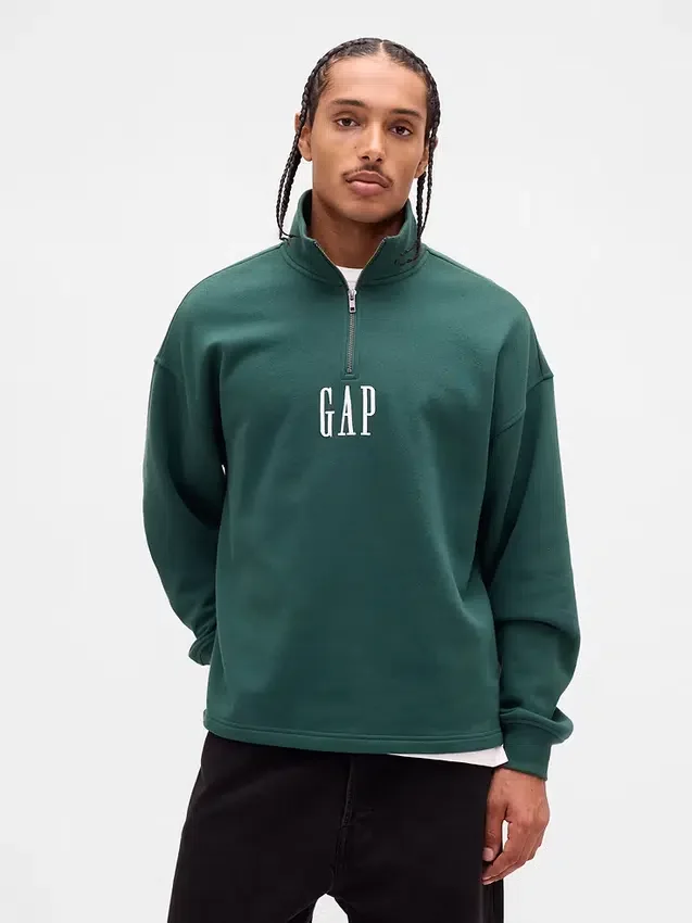 Tjock, oversized tröja med logo och kvartslås
