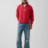 Tjock, oversized tröja med logo och kvartslås
