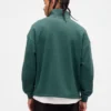 Tjock, oversized tröja med logo och kvartslås