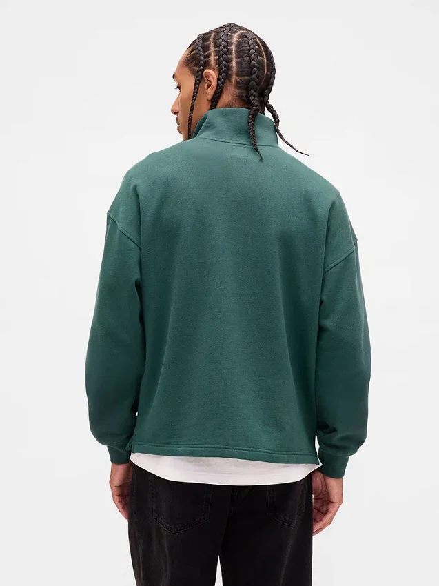 Tjock, oversized tröja med logo och kvartslås