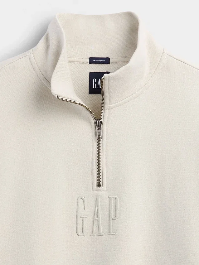Tjock, oversized tröja med logo och kvartslås