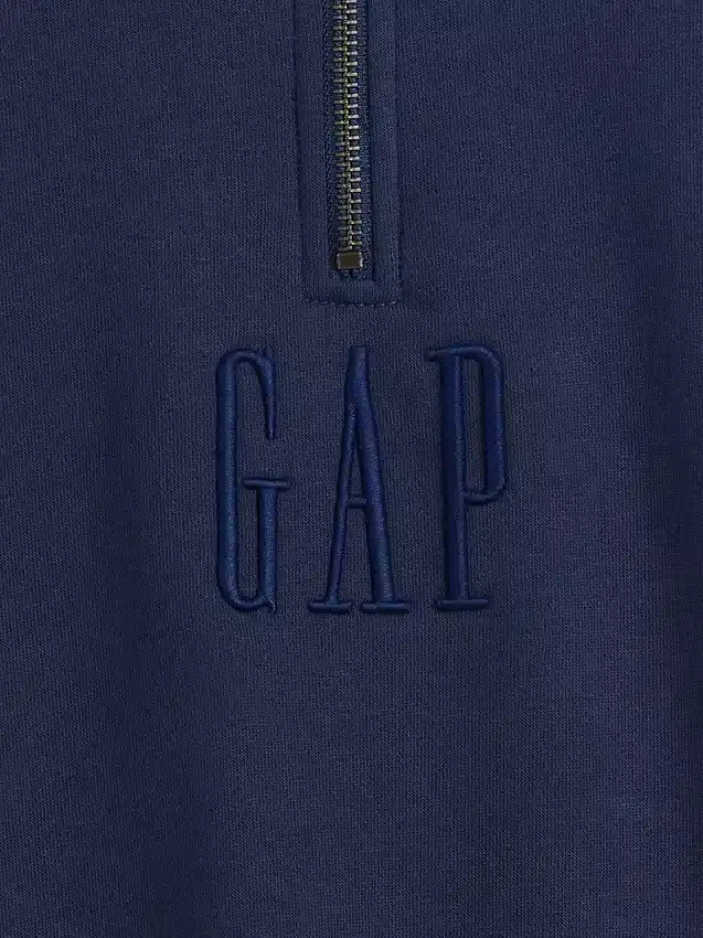 Tjock, oversized tröja med logo och kvartslås