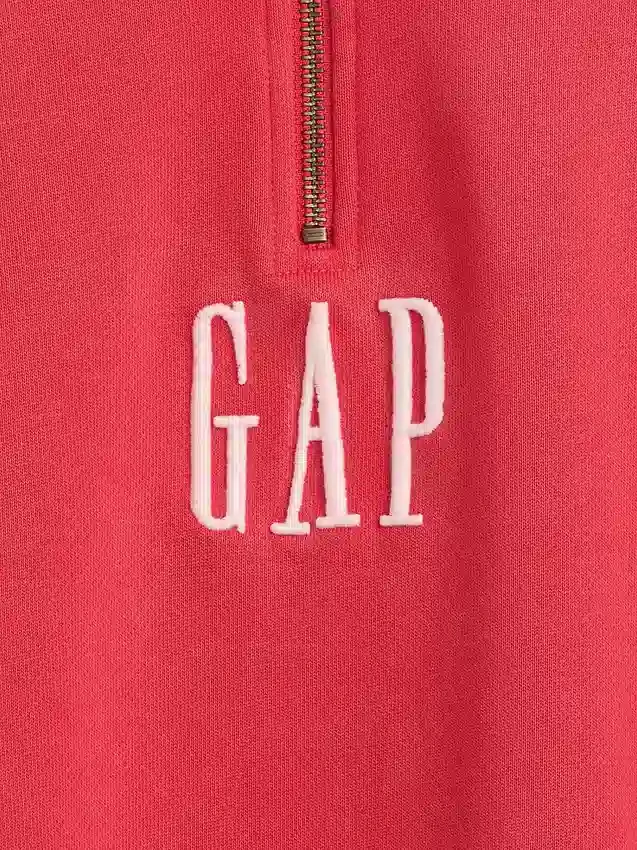 Tjock, oversized tröja med logo och kvartslås