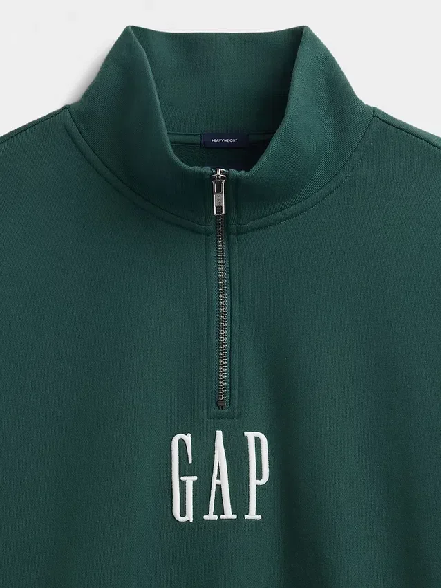 Tjock, oversized tröja med logo och kvartslås