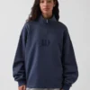 Tjock, oversized tröja med logo och kvartslås