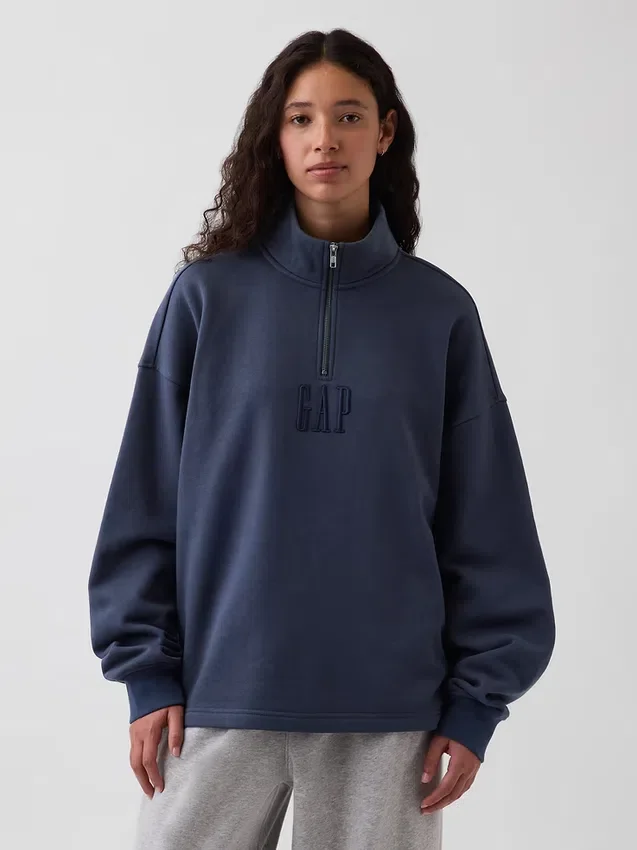Tjock, oversized tröja med logo och kvartslås