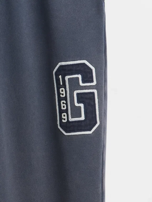 Tjocka, avslappnade sweatpants med logo för vuxna