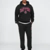 Tjocka joggingbyxor med NBA Toronto Raptors-logotyp