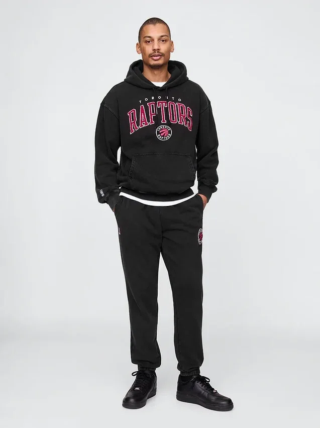 Tjocka joggingbyxor med NBA Toronto Raptors-logotyp