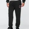 Tjocka joggingbyxor med NBA Toronto Raptors-logotyp