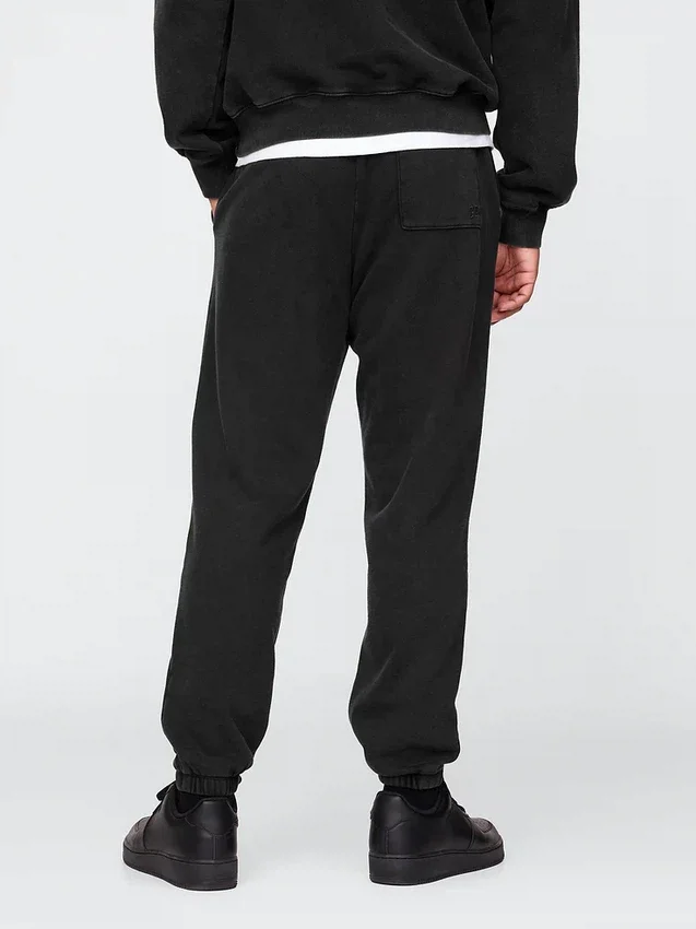 Tjocka joggingbyxor med NBA Toronto Raptors-logotyp