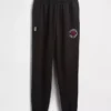 Tjocka joggingbyxor med NBA Toronto Raptors-logotyp