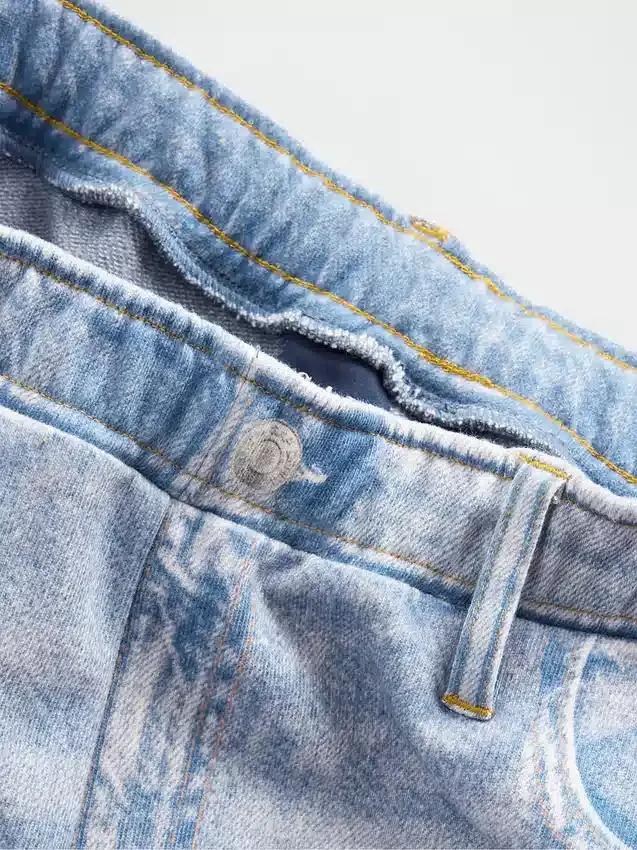 Tryckta, baggy joggingbyxor i Jeanslook