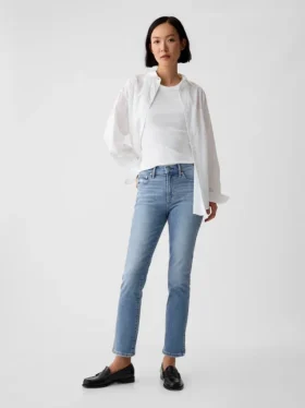 Vintage-jeans med medelhög midja, smal passform och slits i nederkanten