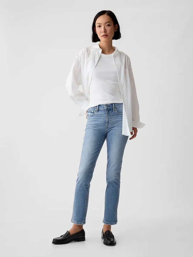 Vintage-jeans med medelhög midja, smal passform och slits i nederkanten