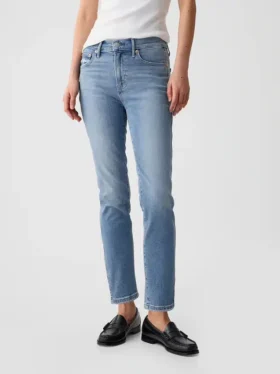 Vintage-jeans med medelhög midja, smal passform och slits i nederkanten