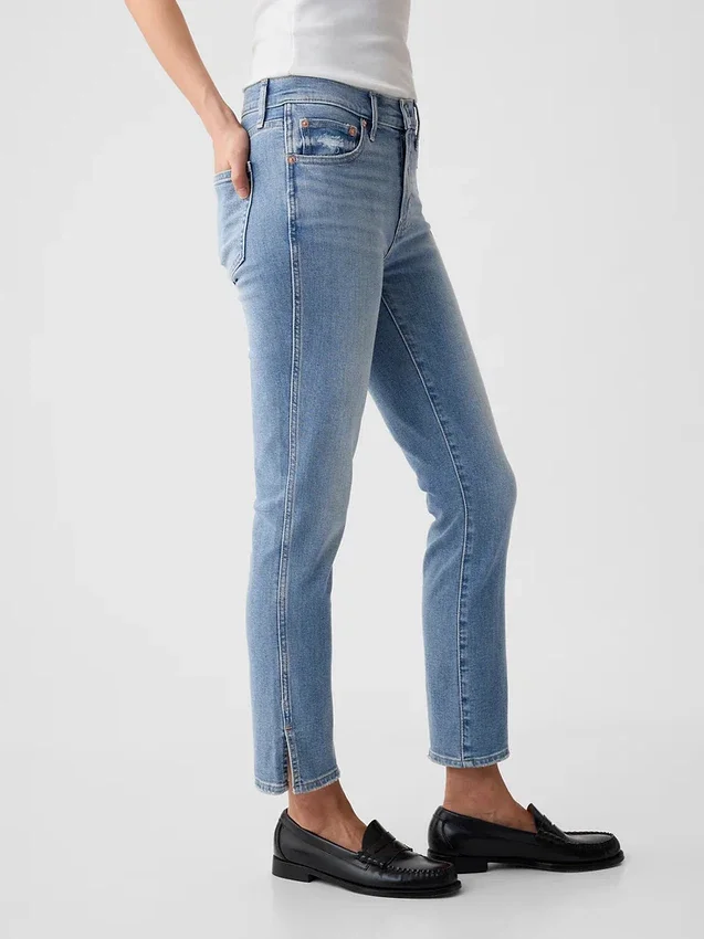 Vintage-jeans med medelhög midja, smal passform och slits i nederkanten