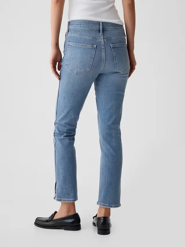 Vintage-jeans med medelhög midja, smal passform och slits i nederkanten