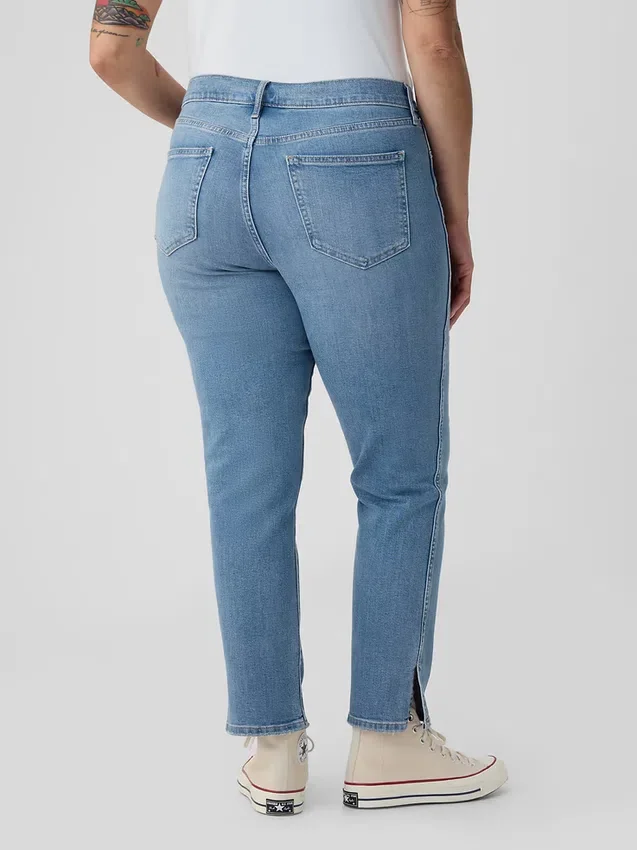 Vintage-jeans med medelhög midja, smal passform och slits i nederkanten