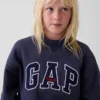 Vintagesoft-tröja i oversized-modell med hög hals och logotyp för barn